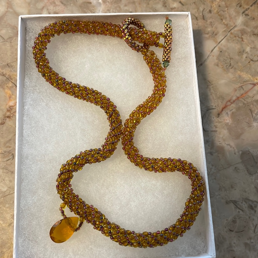 Handcrafted beaded tan necklace with closure